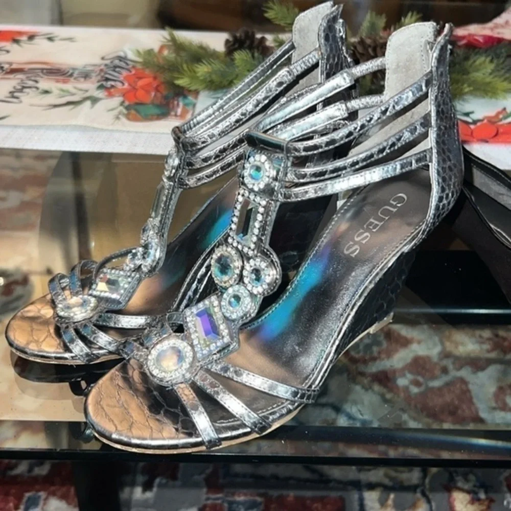 Guess heels about to 4inches, big rhinestones , bright and shiny